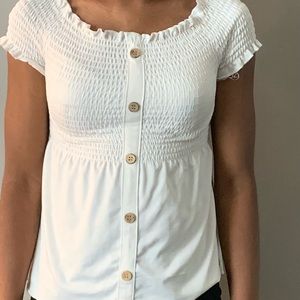 Rue21 white blouse , wooden buttons in the the middle